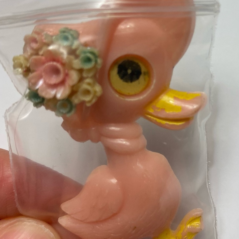 Plastic winking eye mother goose vintage pin